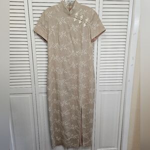 Elegant Tan Midi Dress with Floral Accents